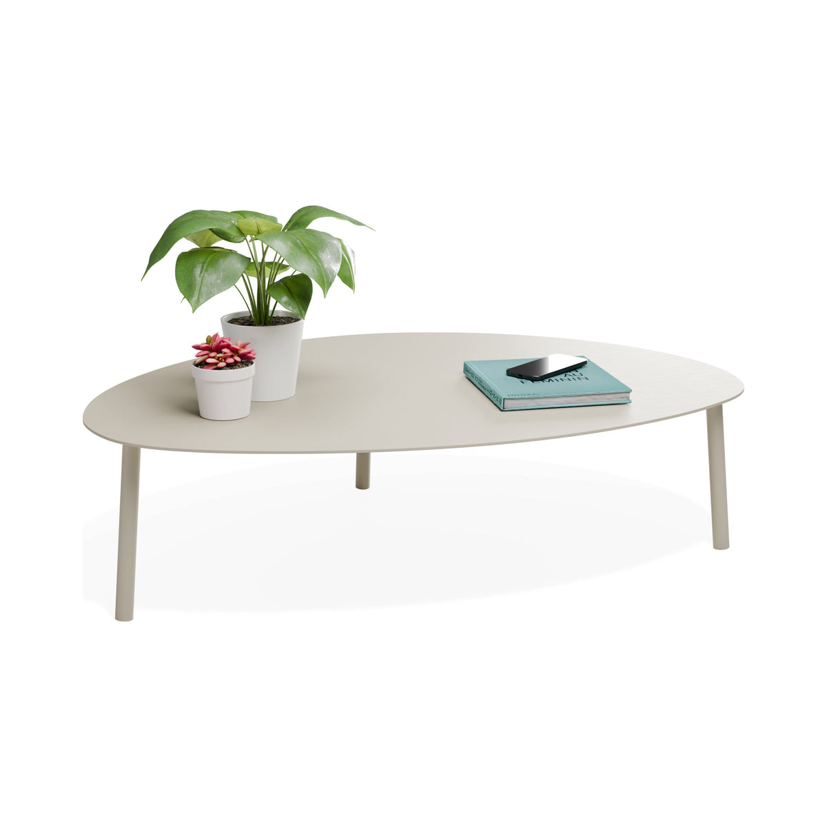 Cetara large coffee table in latte, styled with plants, three-quarter view