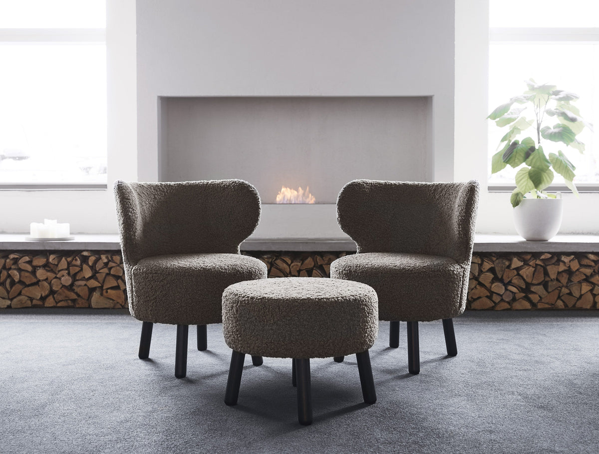 Cute easy chairs in a styled interior