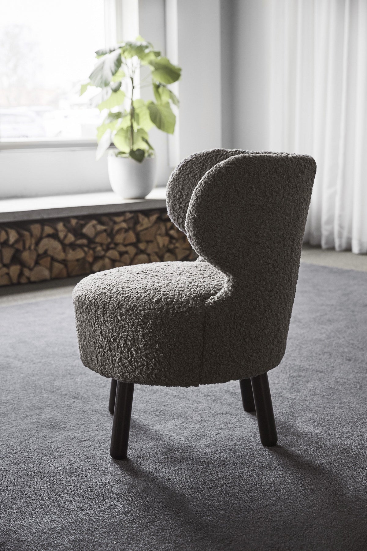 Cute easy chairs in a styled interior