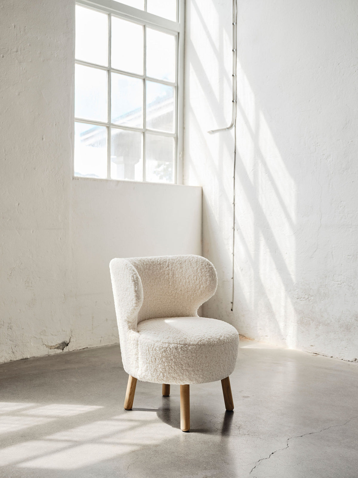 Cute easy chairs in a styled interior
