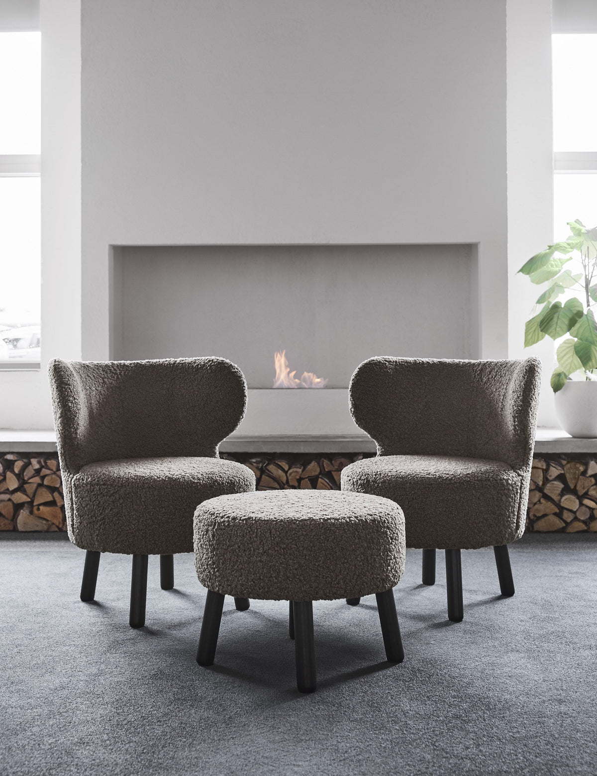 Cute chairs and pouf in a styled interior