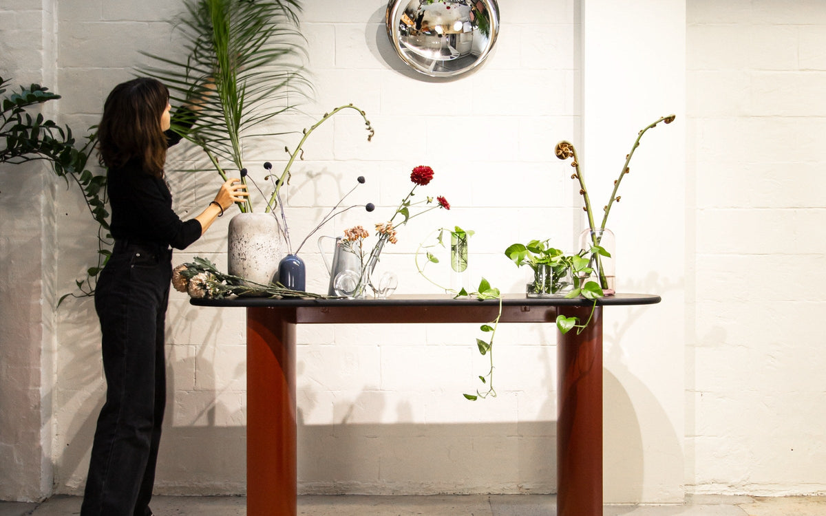 HALFMOON console in a styled space