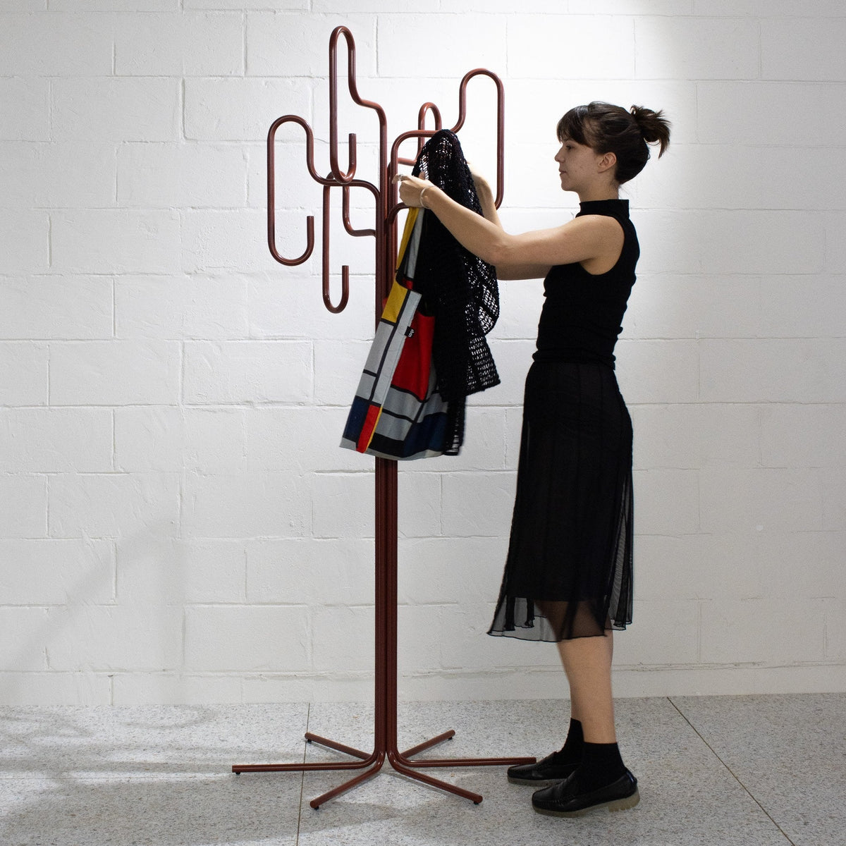 HUNGER coat stand in use