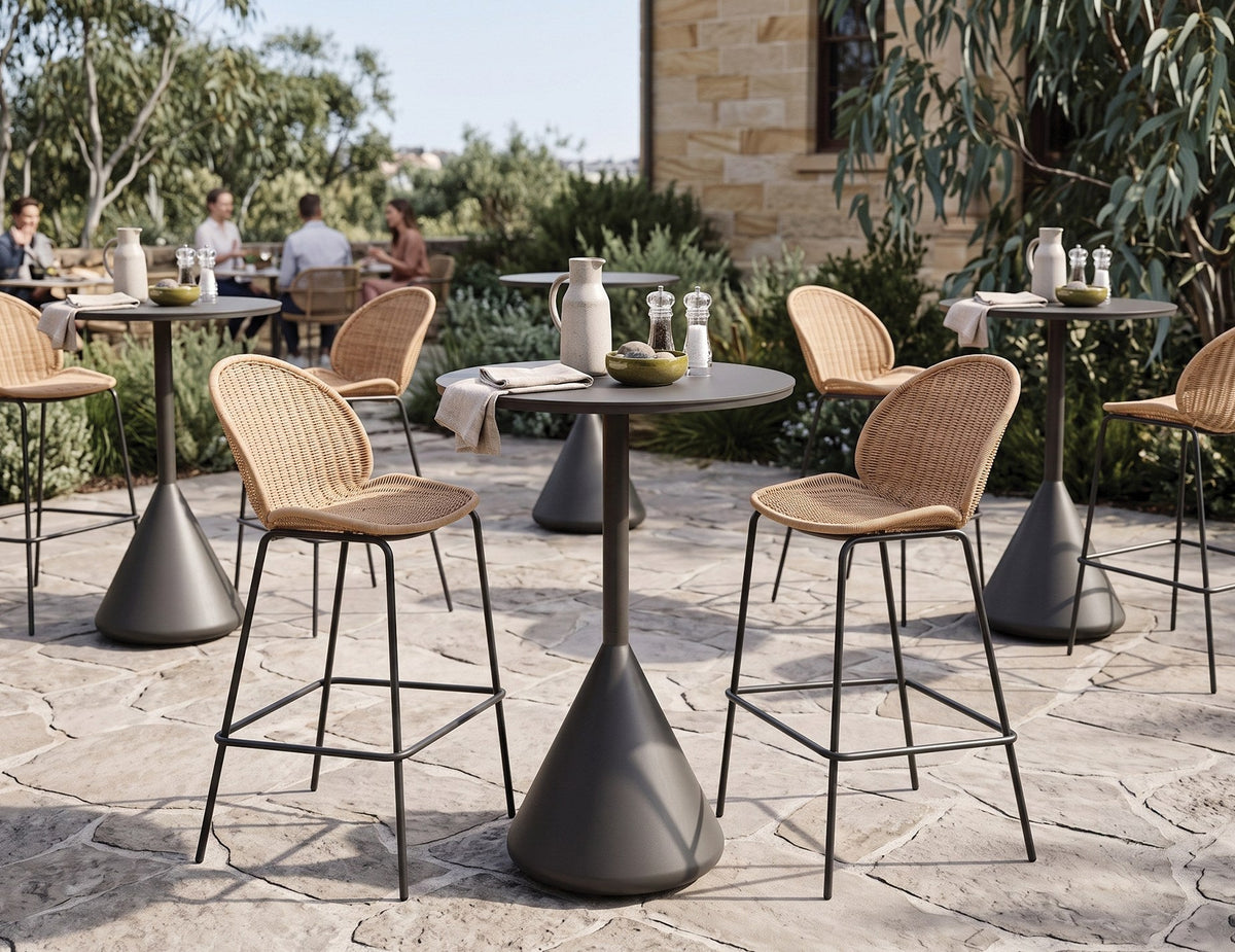 Kora Outdoor High Bar Table in a styled interior