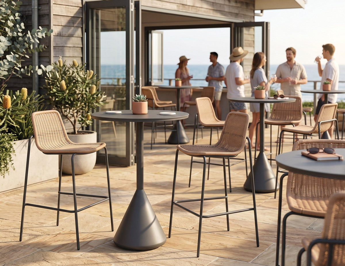 Kora Outdoor High Bar Table in a styled interior