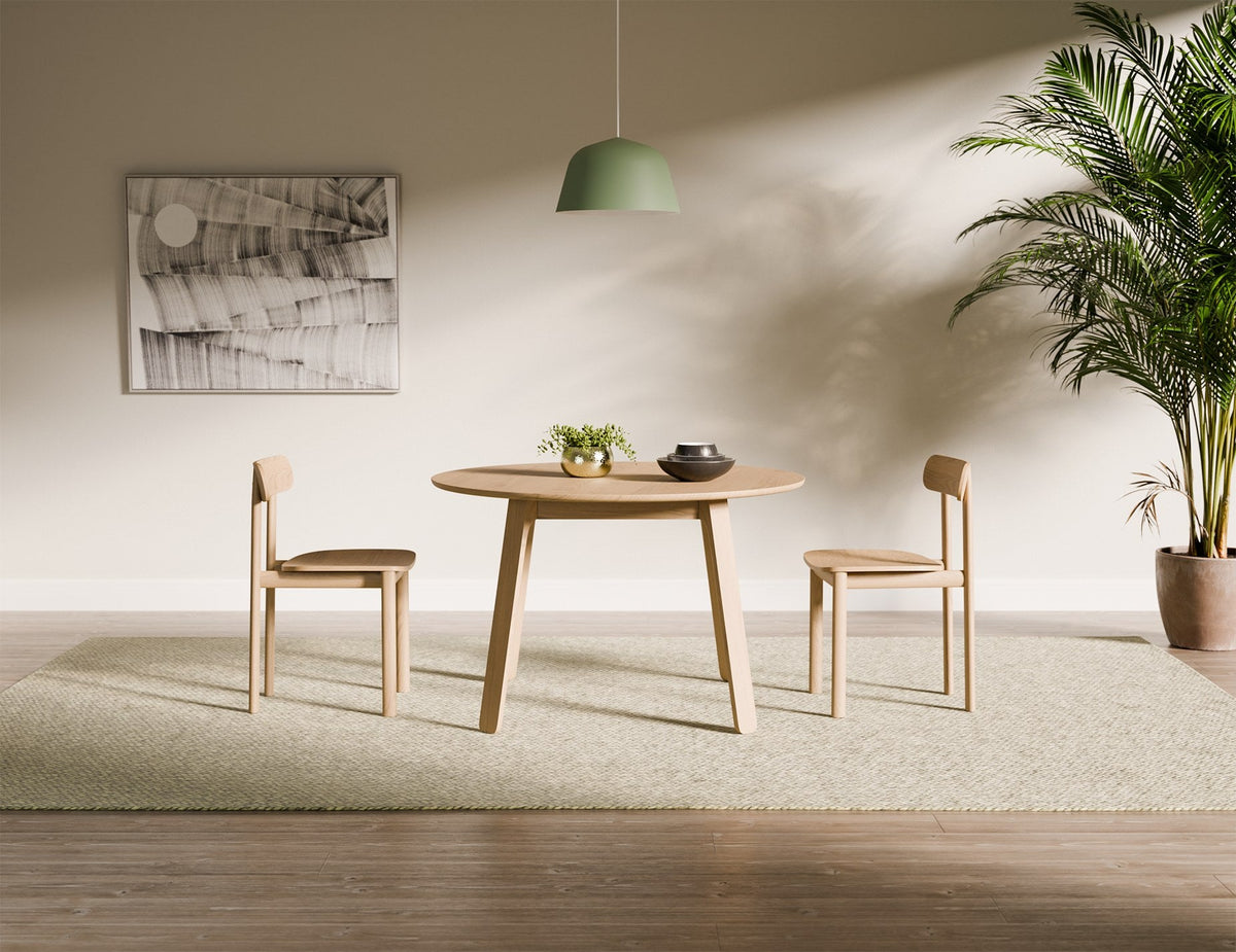 Mateo Round Dining Table in a styled interior