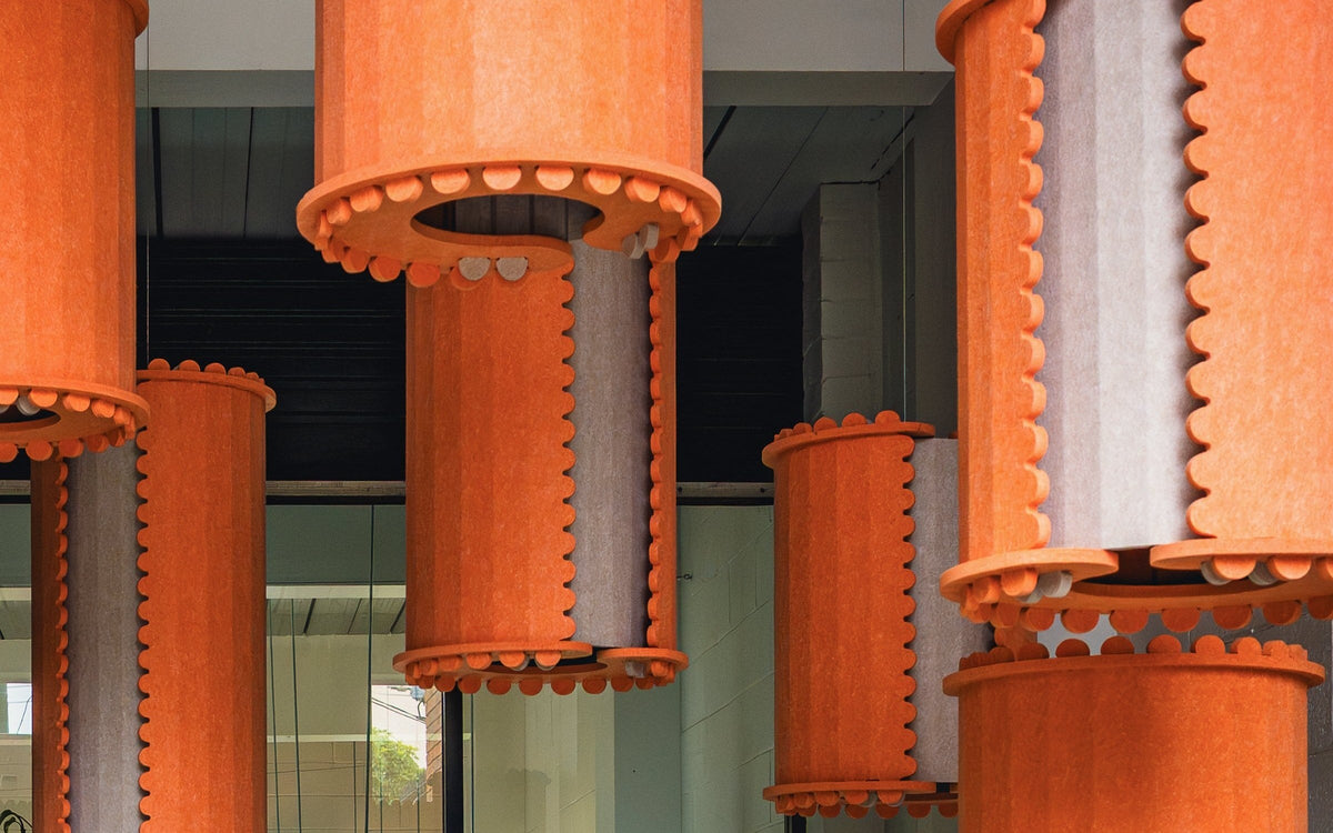 OM acoustic pendants in orange