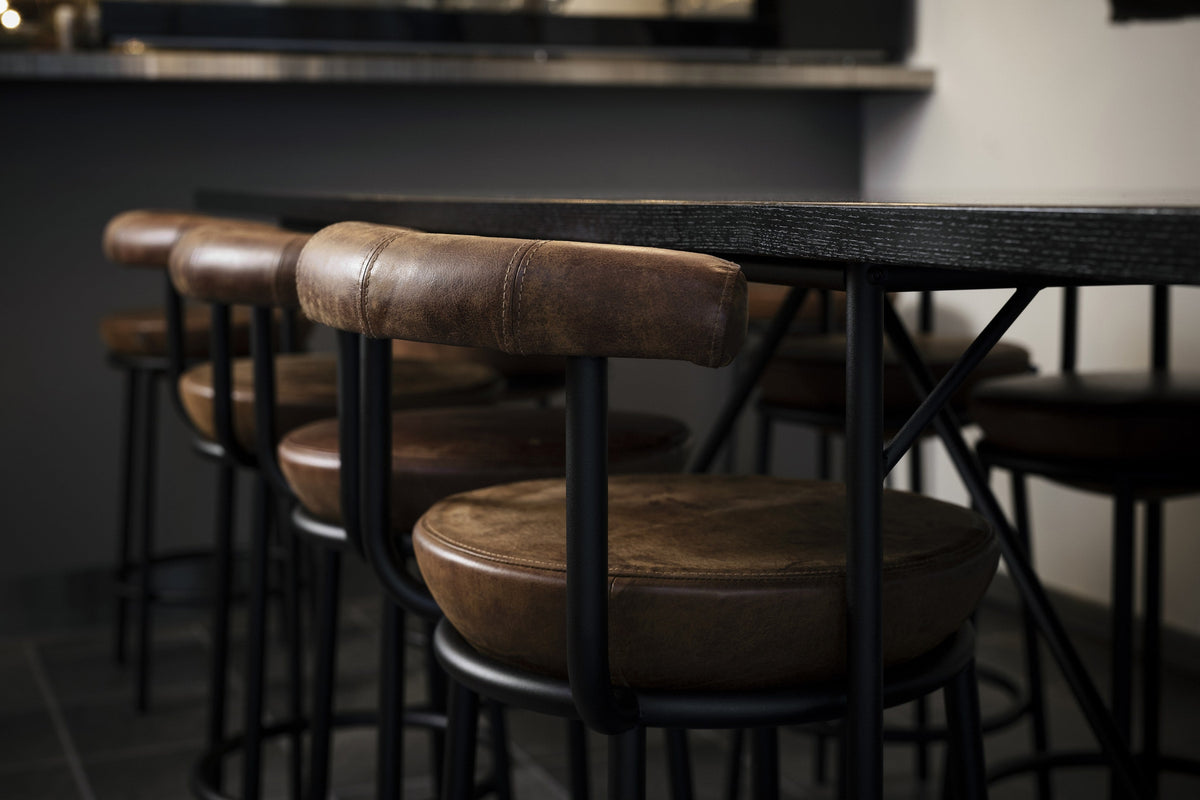 Pod bar stools at a hotel bar