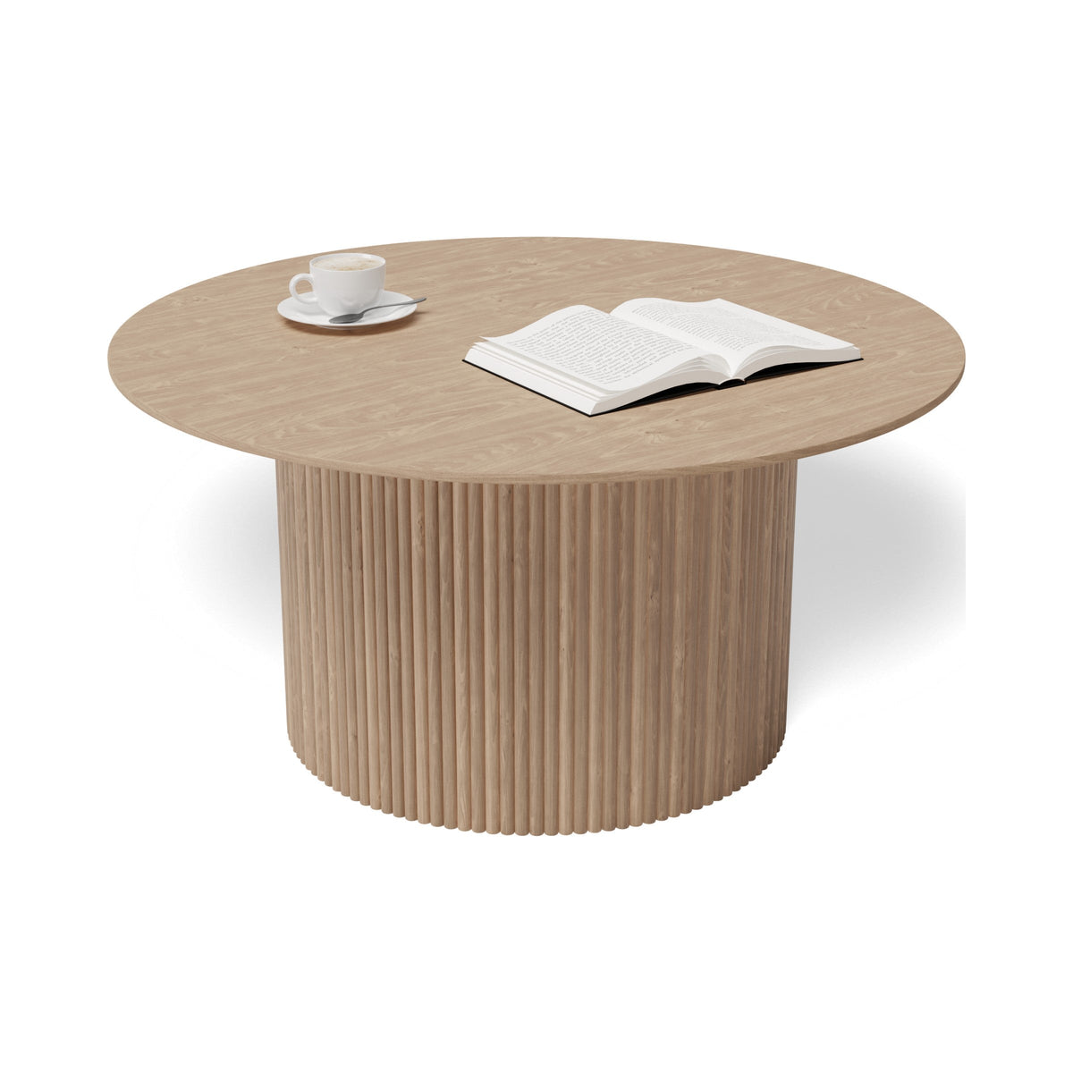 Poppy round coffee table in natural ash, styled with a book, viewed from above