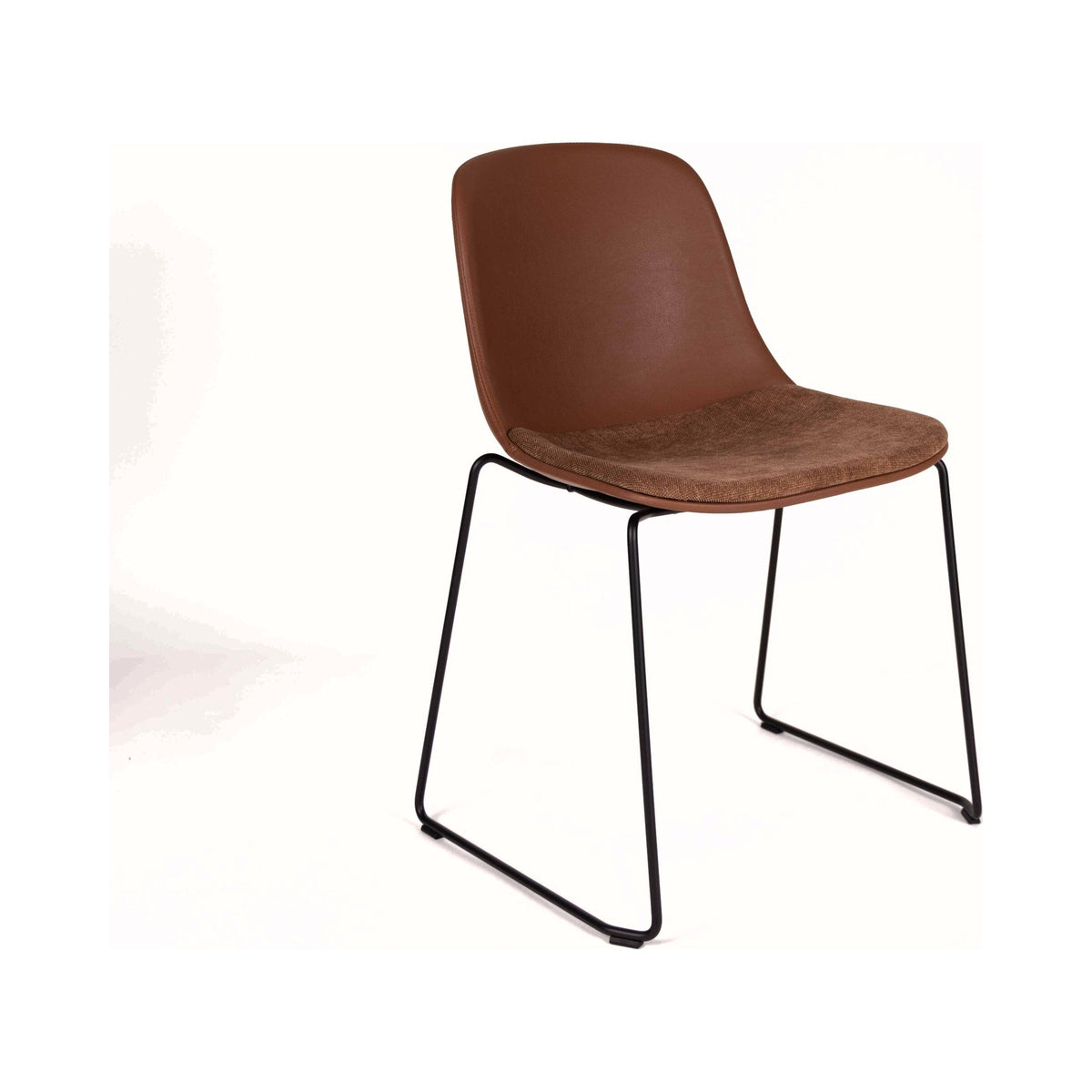 Pure Loop Sled Chair in russet leather, side view