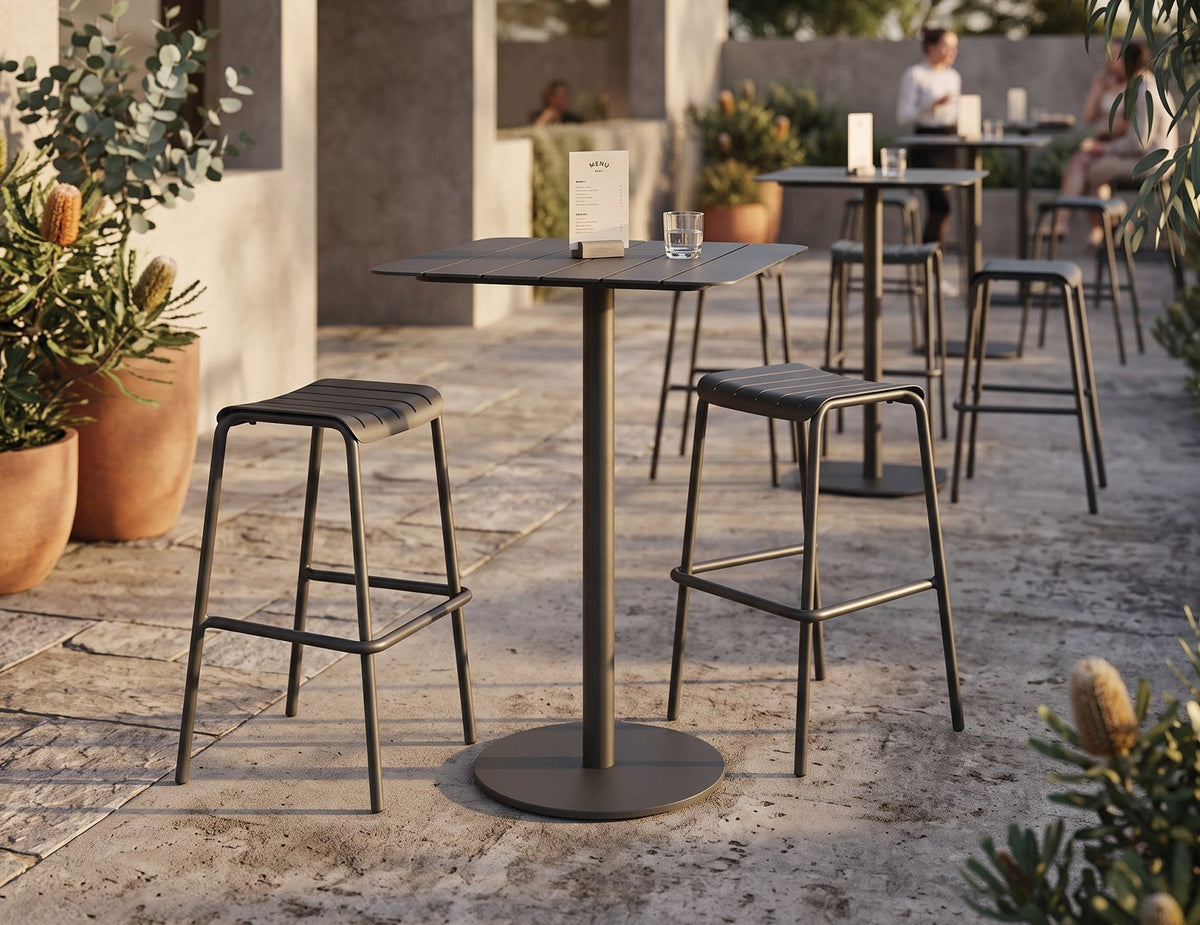 Roku Outdoor High Bar Table in a styled interior