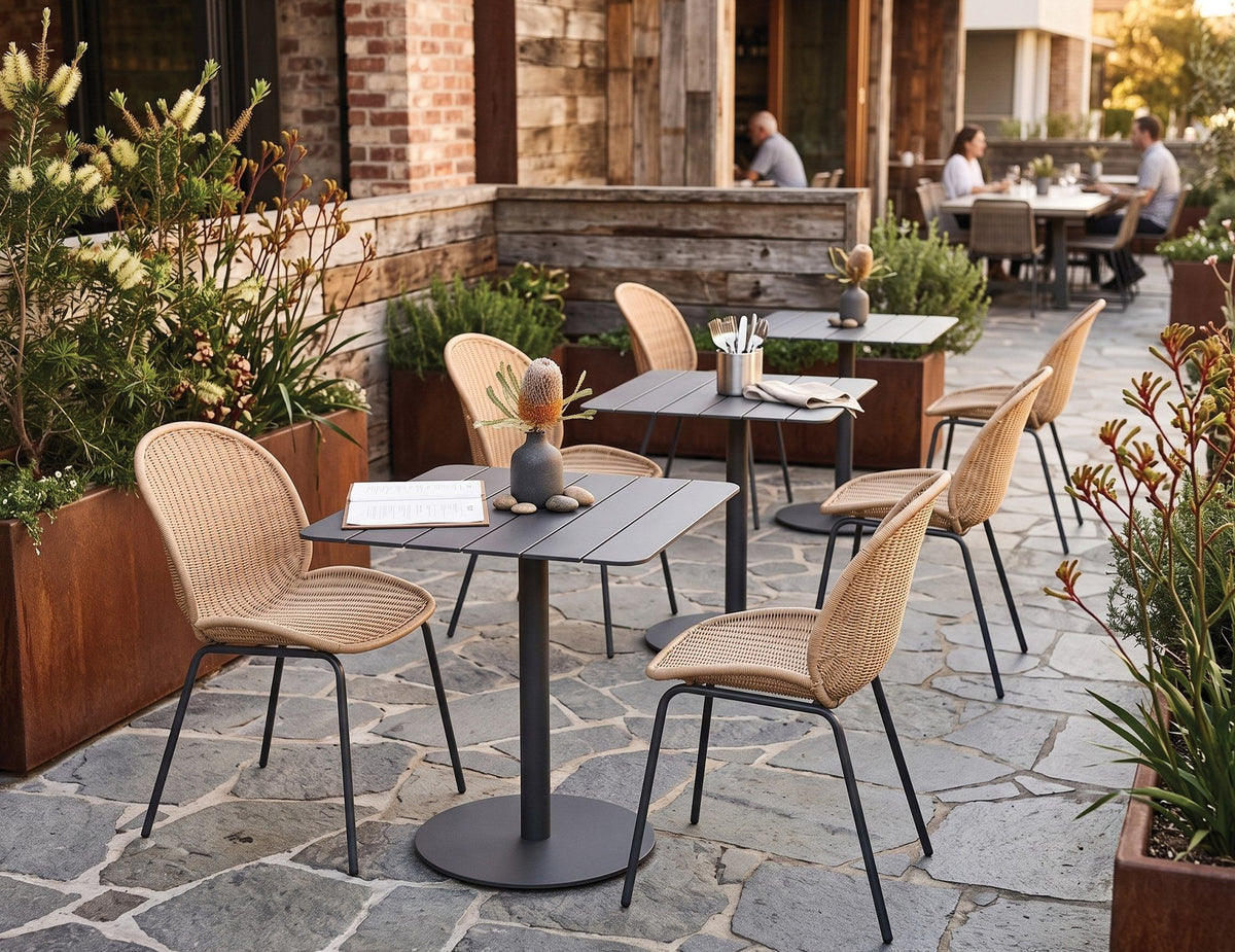 Sombra Outdoor Rattan Dining Chair in a styled interior