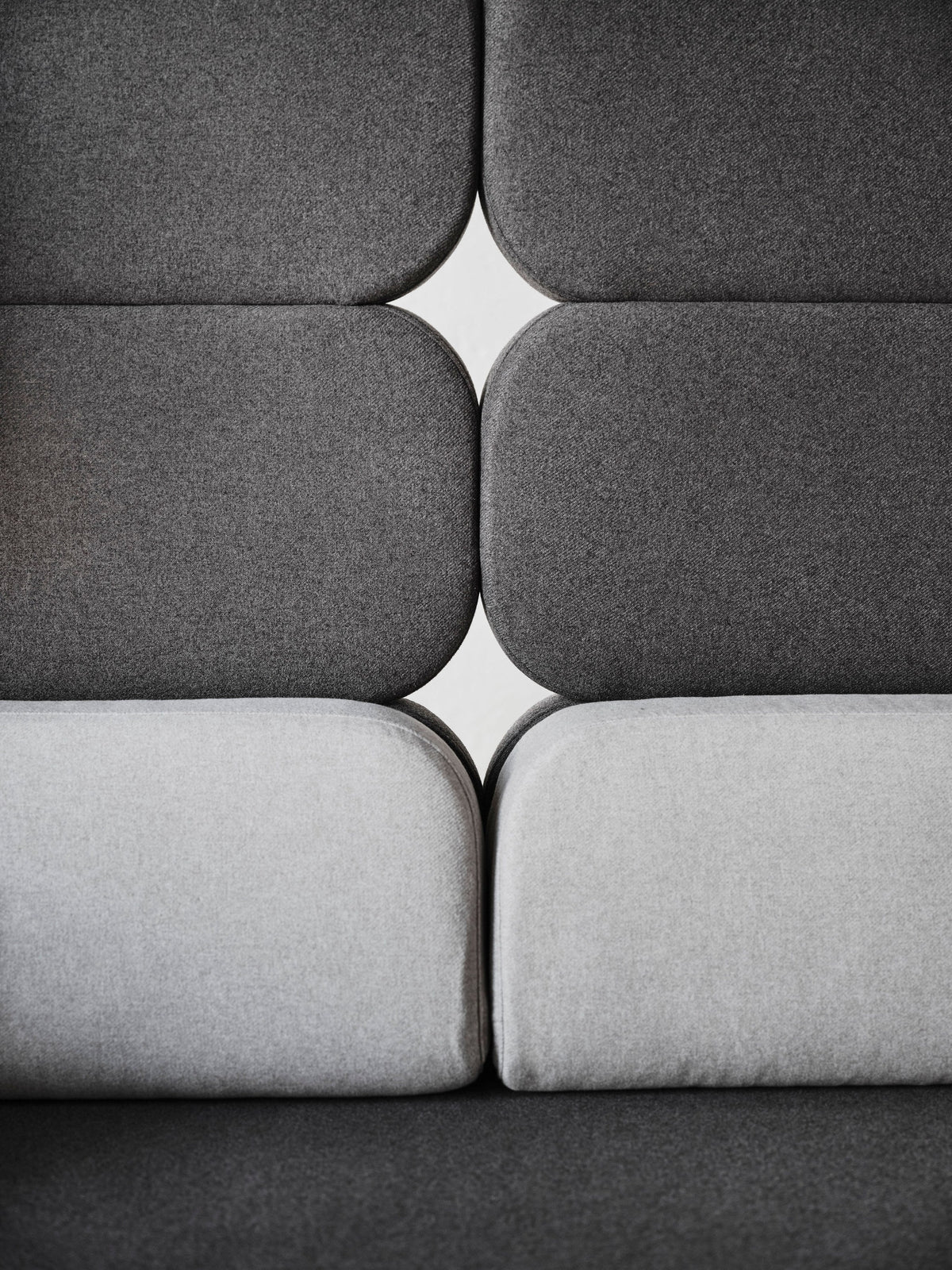 Story high-backed seating in a styled interior