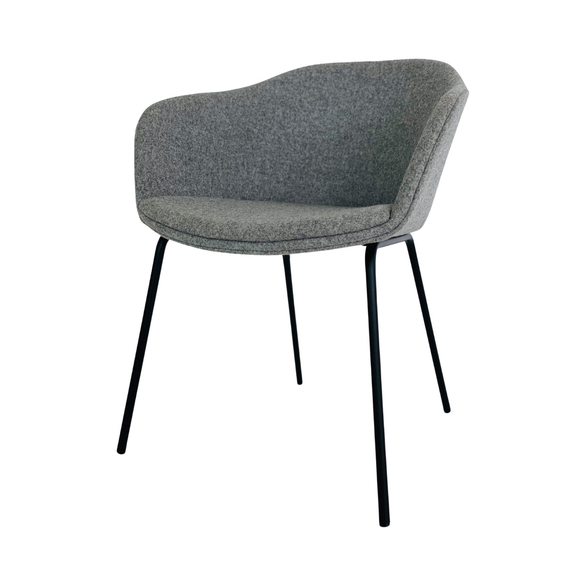 Tubby Chair on black metal legs, three-quarter view