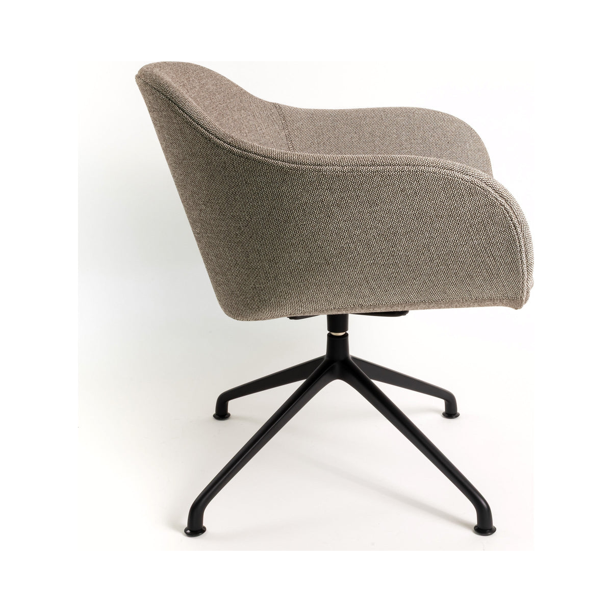 Tubby Lounge Chair on a swivel base, side view