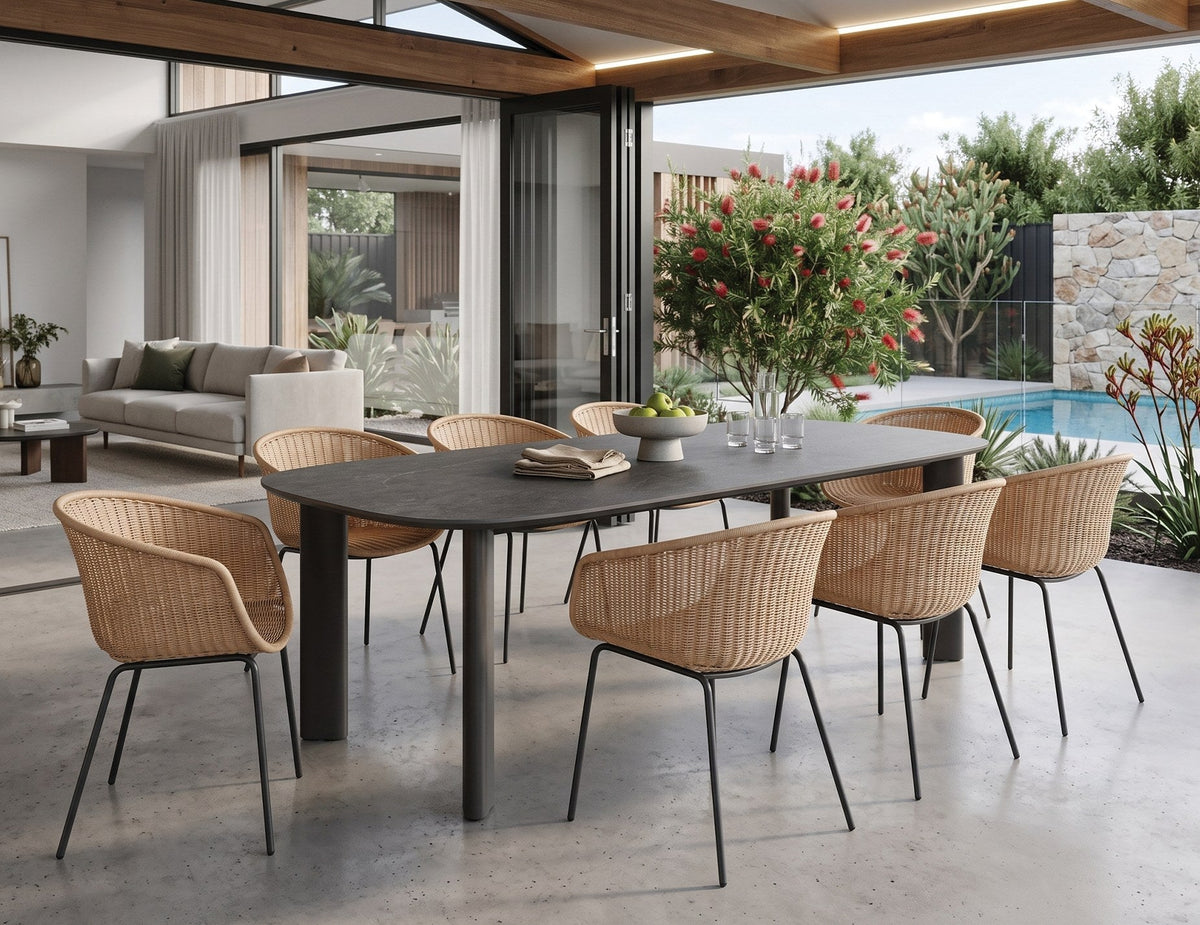 Vela Outdoor Dining Table in a styled interior