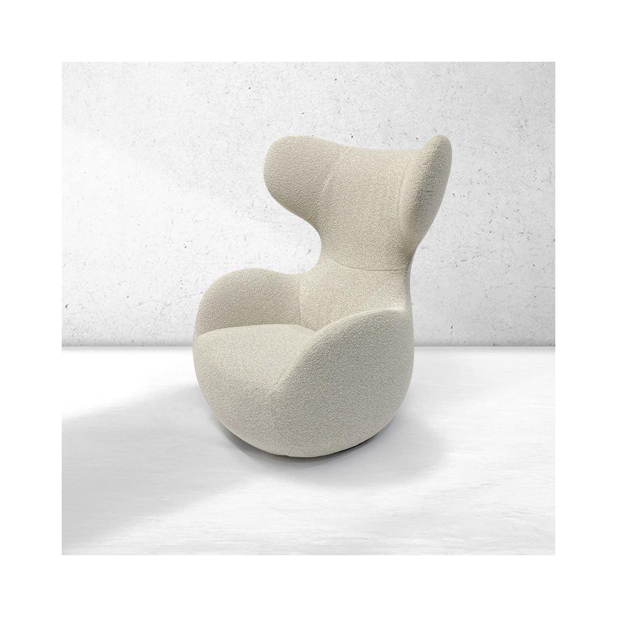 Adele armchair in cream, three-quarter view