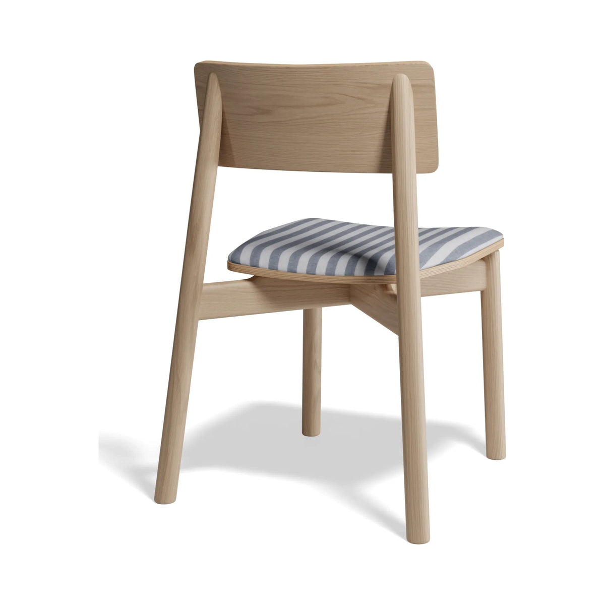 Andi Chair in natural ash with a striped seat pad, rear three-quarter view