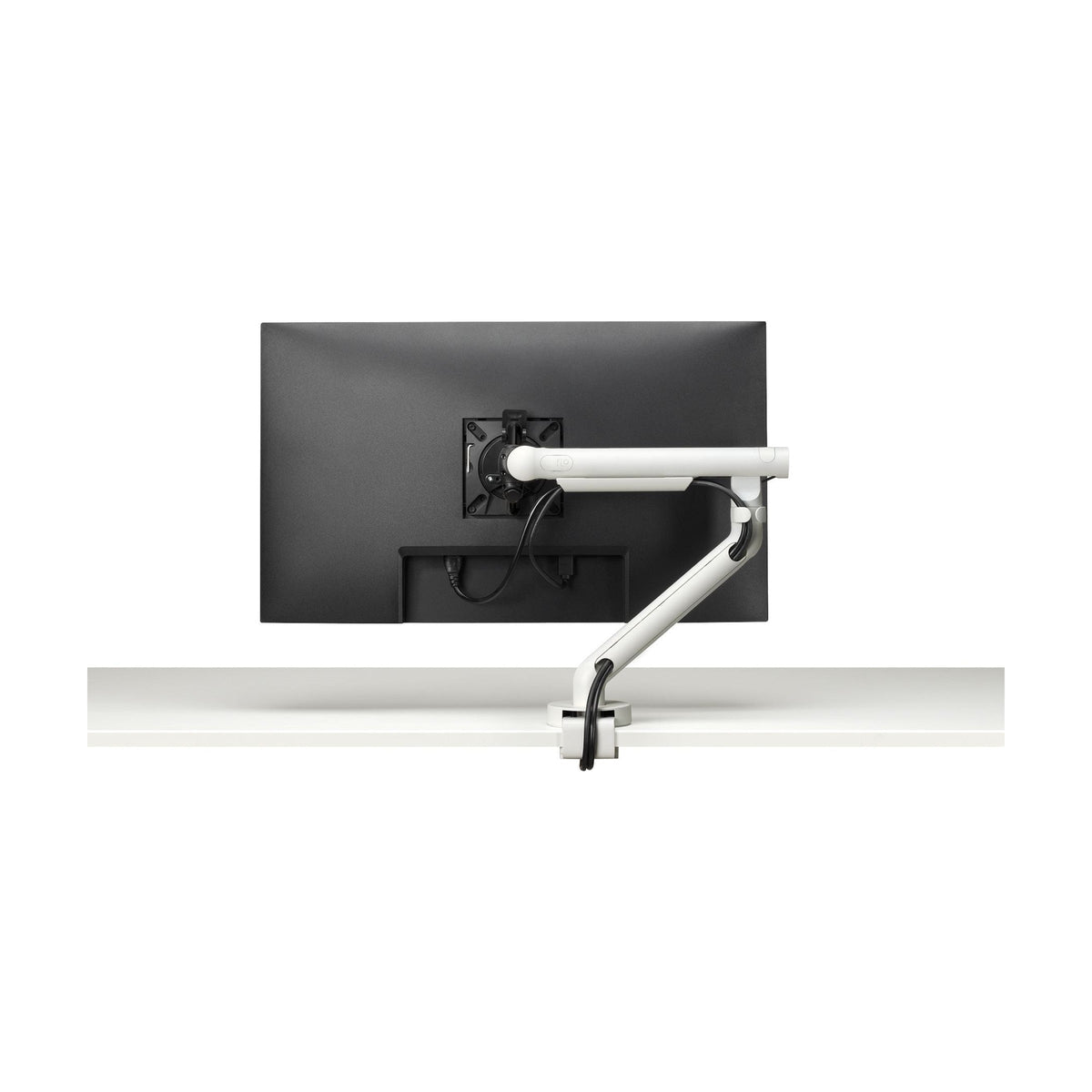 Flo Monitor Arm rear view, showing the cable management and desk clamp