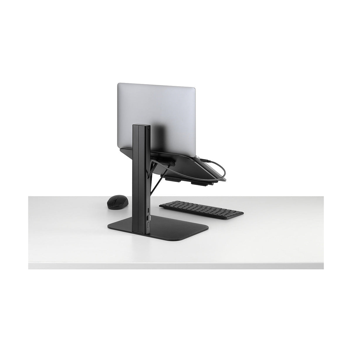 Lana Laptop Stand in Black holding a laptop, three-quarter view