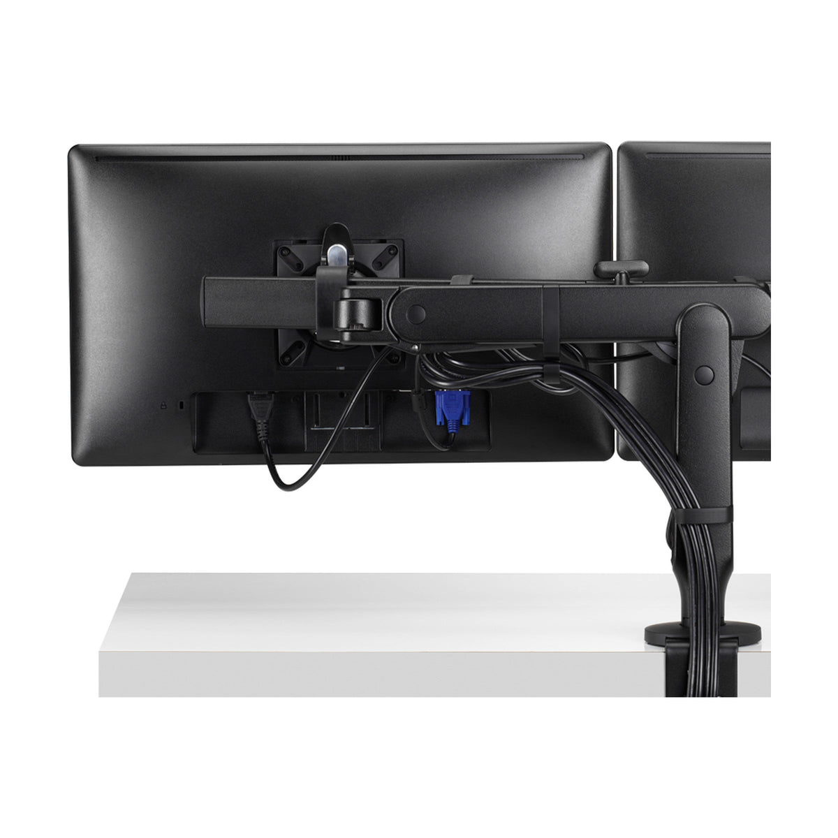 Ollin Dual Monitor Arm rear view, showing cable routing through the post