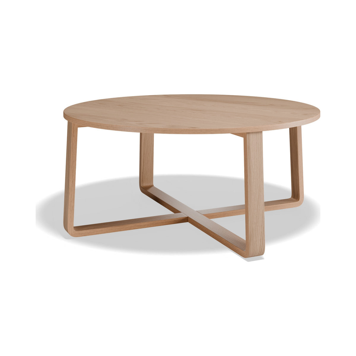Eddy round coffee table in natural ash, three-quarter view