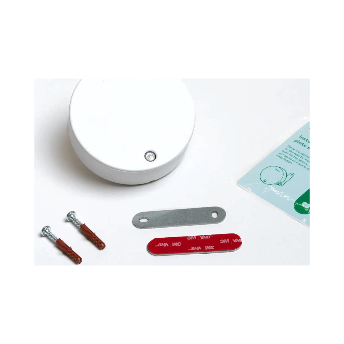 Framery Room Sensor with its magnetic mounting kit