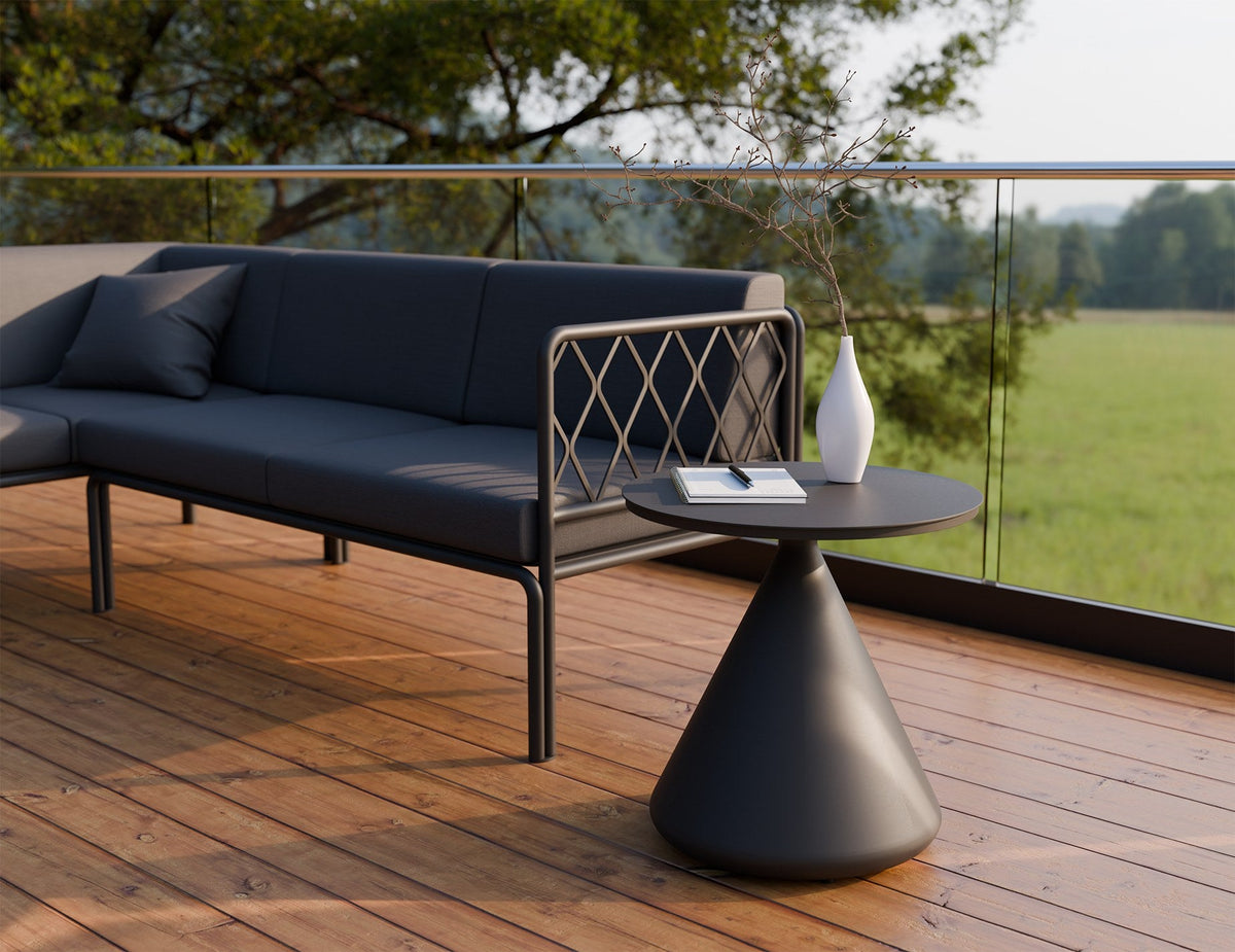 Kora Outdoor Side Table in a styled interior
