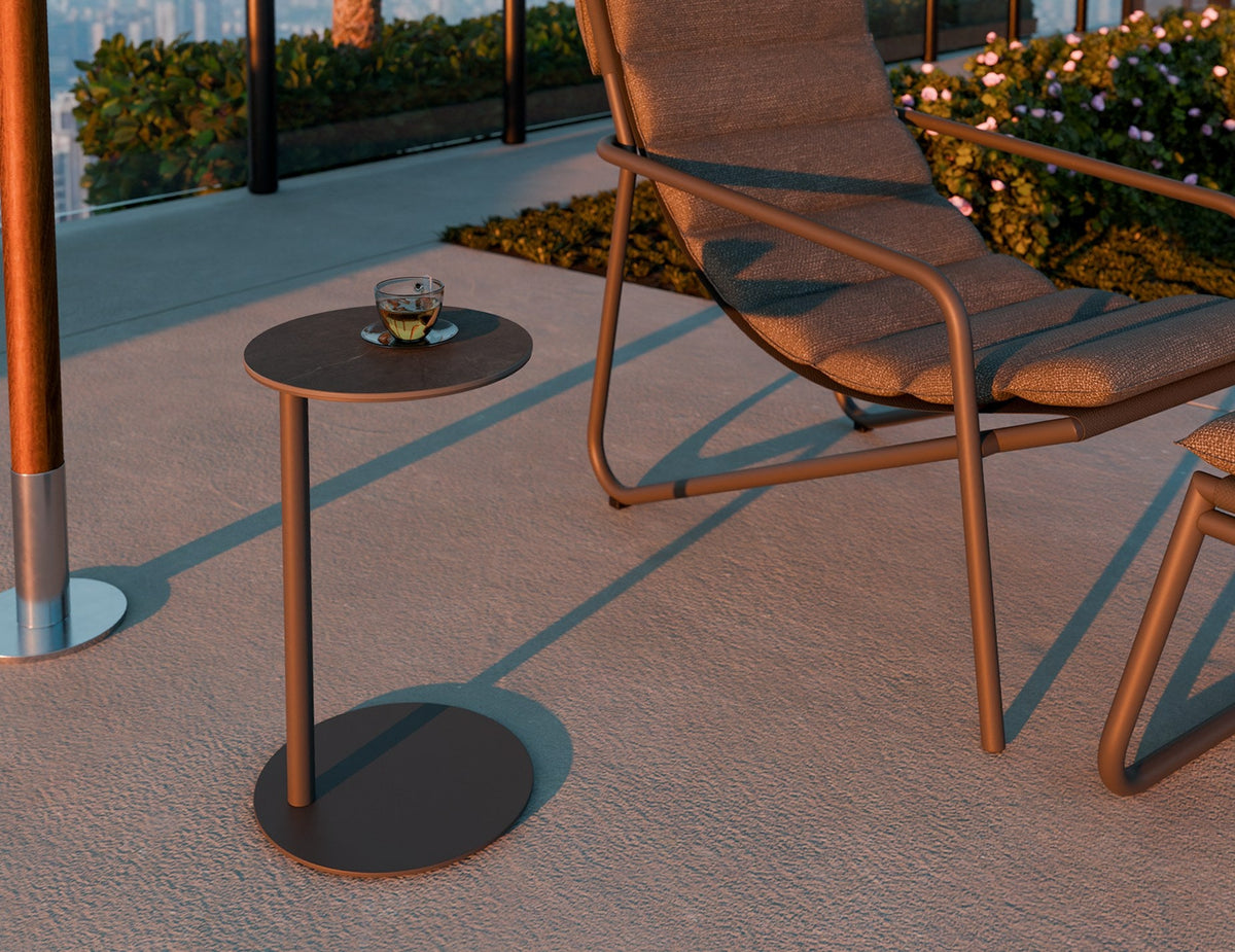 Lira Outdoor Side Table in a styled interior
