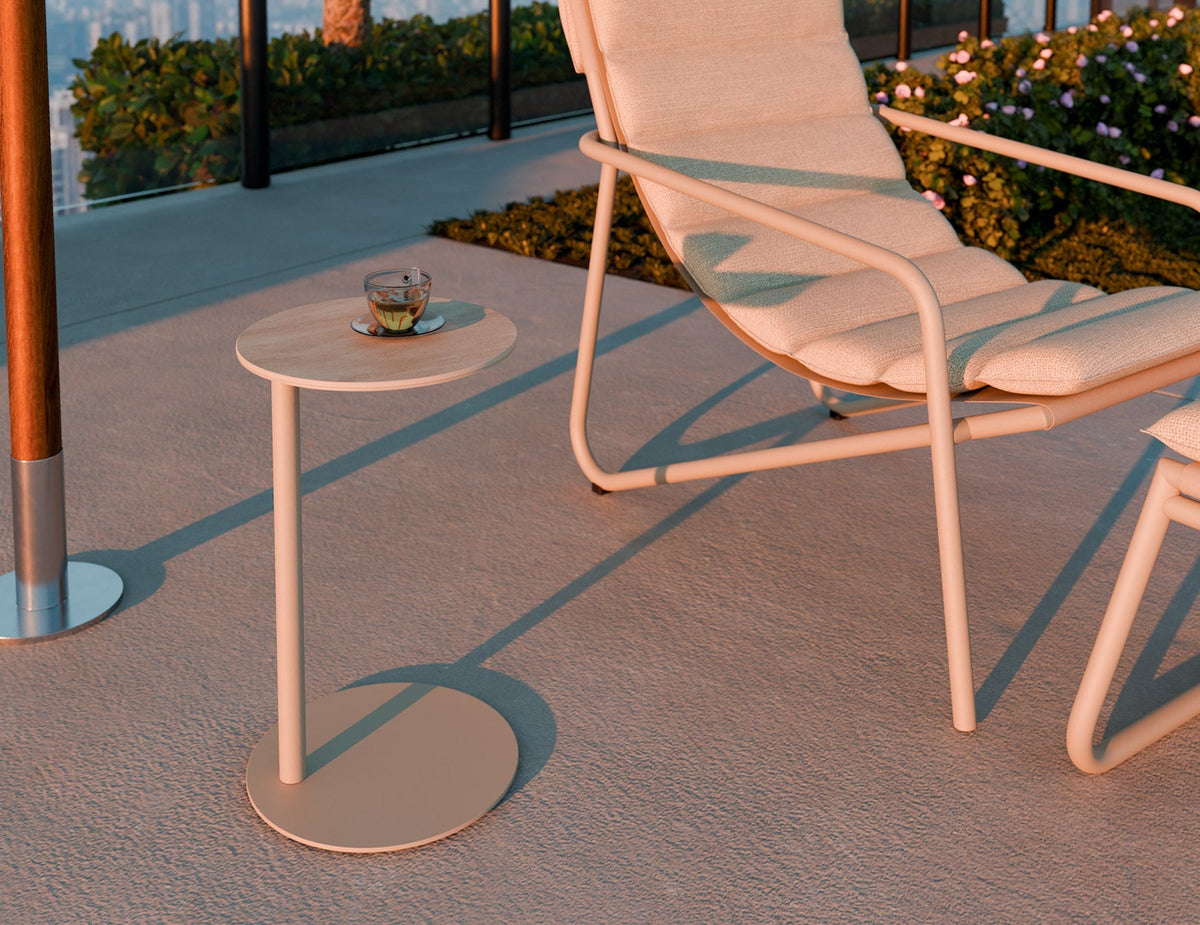 Lira Outdoor Side Table in a styled interior
