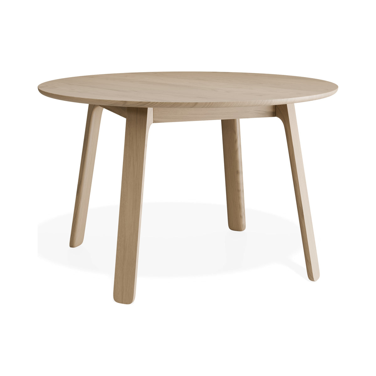Mateo round dining table in natural ash, three-quarter view