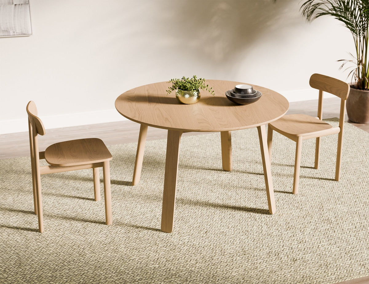 Mateo Round Dining Table in a styled interior