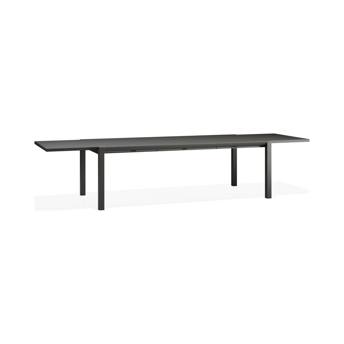 Reflect outdoor table in charcoal, extended, three-quarter view