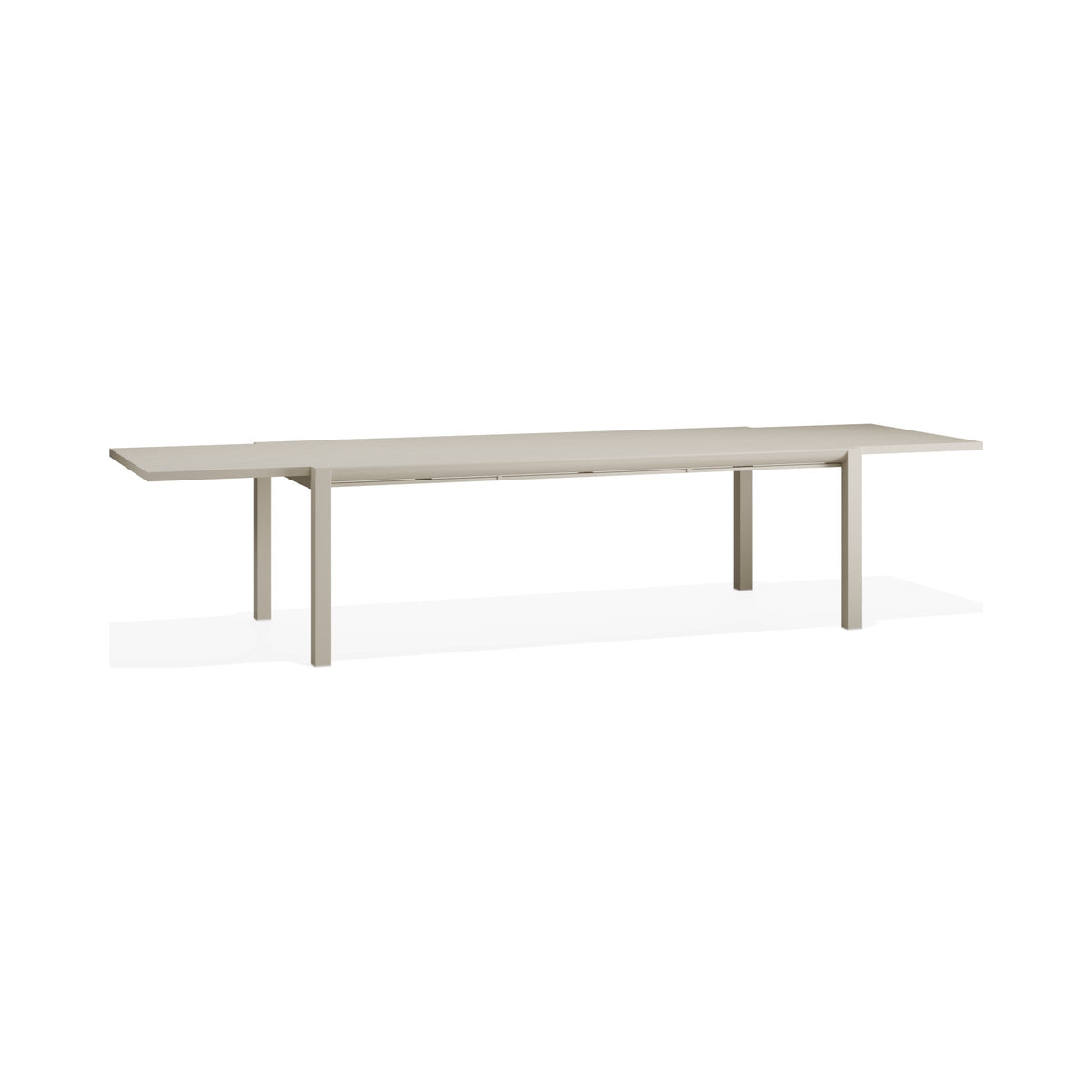Reflect outdoor table in latte, extended, three-quarter view